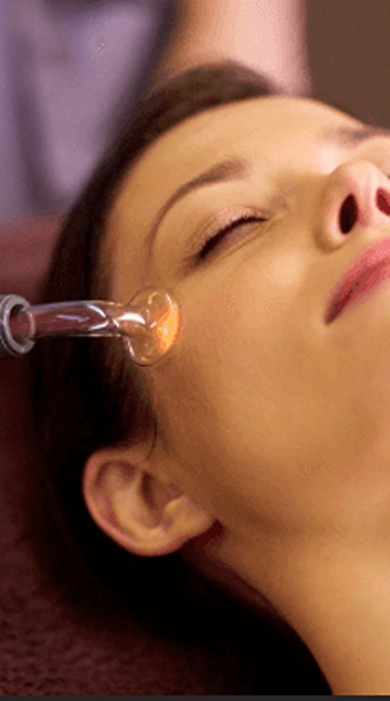 Woman having a facial treatment at beauty artist studio
